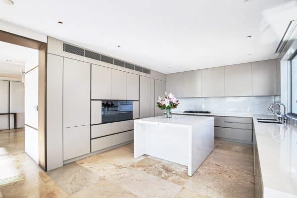 bianco santorini marble kitchen island and splashback