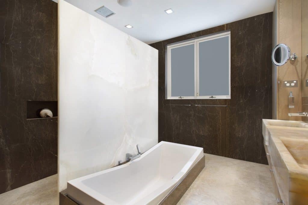 white onyx bathroom feature wall